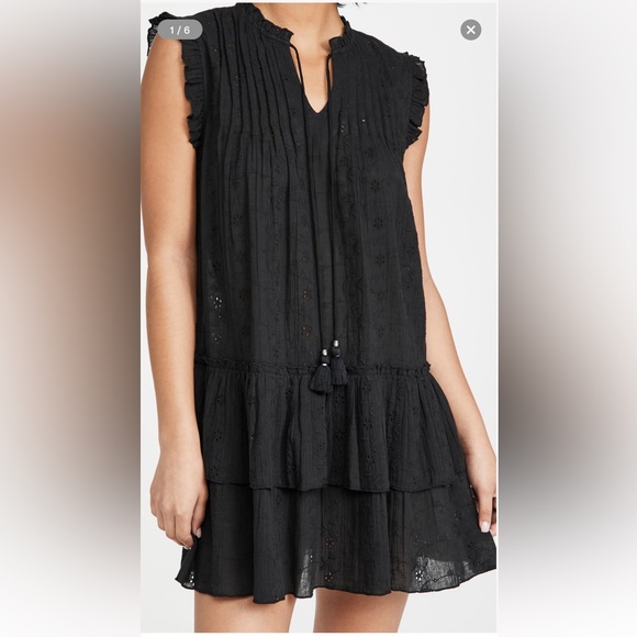 Subtle eyelet patterning, delicate ruffles, and a layered skirt - Picture 4 of 4